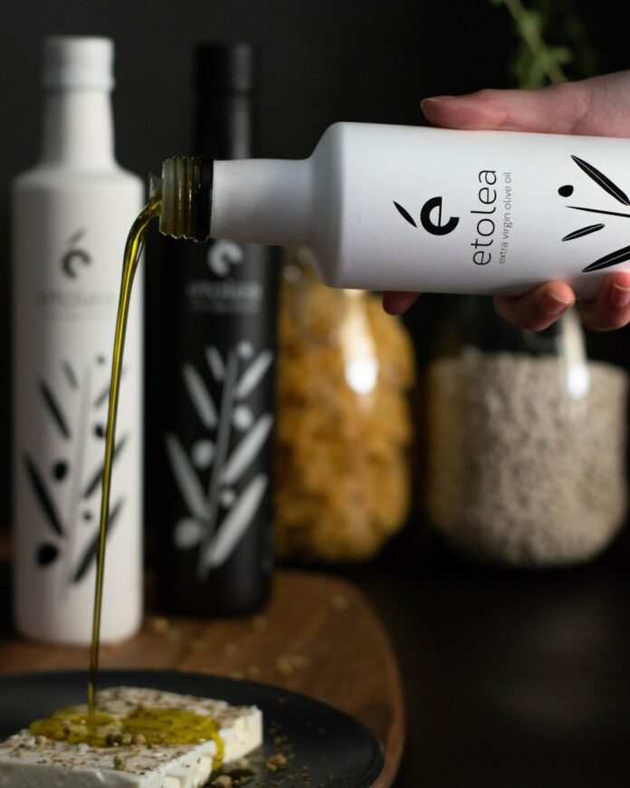 a person holding a bottle