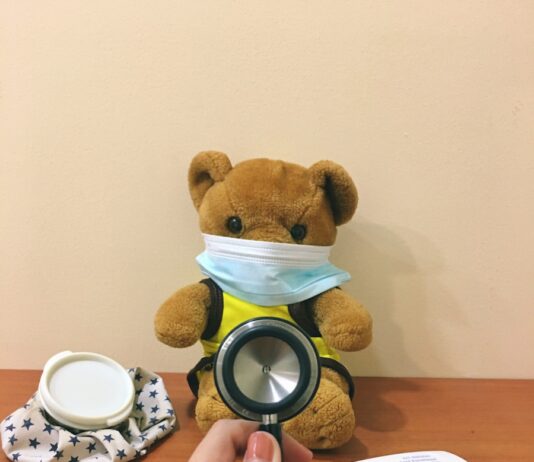 면역력 강화를 위한 운동법, 몸과 마음을 동시에 챙기다 brown bear plush toy beside white and black round frame