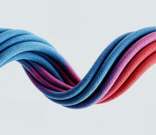 “손발이 자꾸 차가운 이유”…‘혈액순환’ 말고 봐야 할 의외의 원인 Colorful, wavy cables intertwine against a white background.