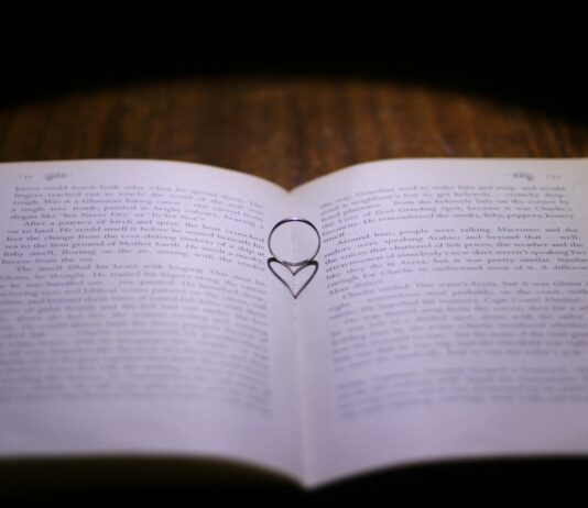 일상 속 정신건강 지키기, 작은 루틴이 큰 변화를 만든다 white book page on brown wooden table